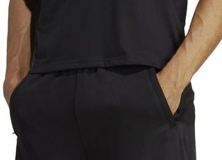 Shorts de treino adidas masculino Train Essentials Seasonal Camo com logotipo preenchido, preto, tamanho GG