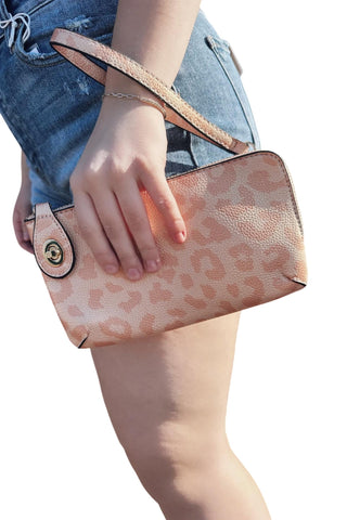 Jen &amp; Co. - Bolsa transversal com estampa de chita e fecho giratório