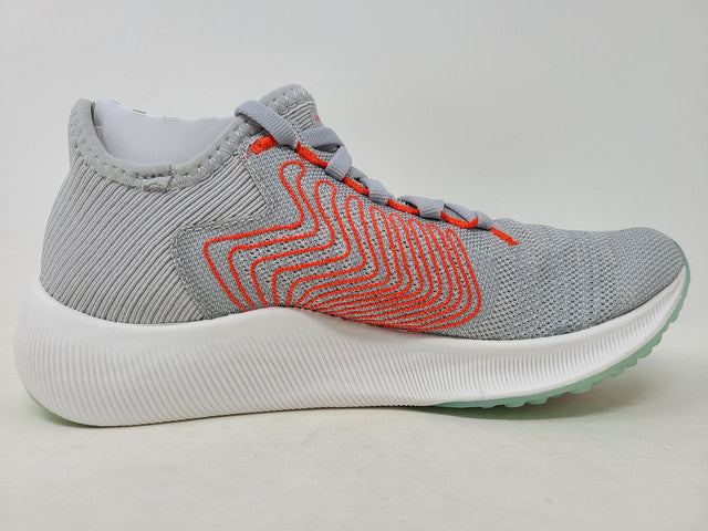 Tênis de corrida New Balance FuelCell Rebel feminino cinza/laranja