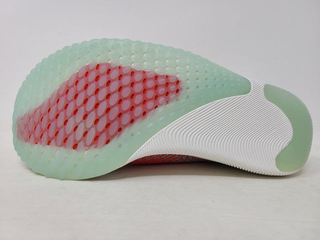 Tênis de corrida New Balance FuelCell Rebel feminino cinza/laranja