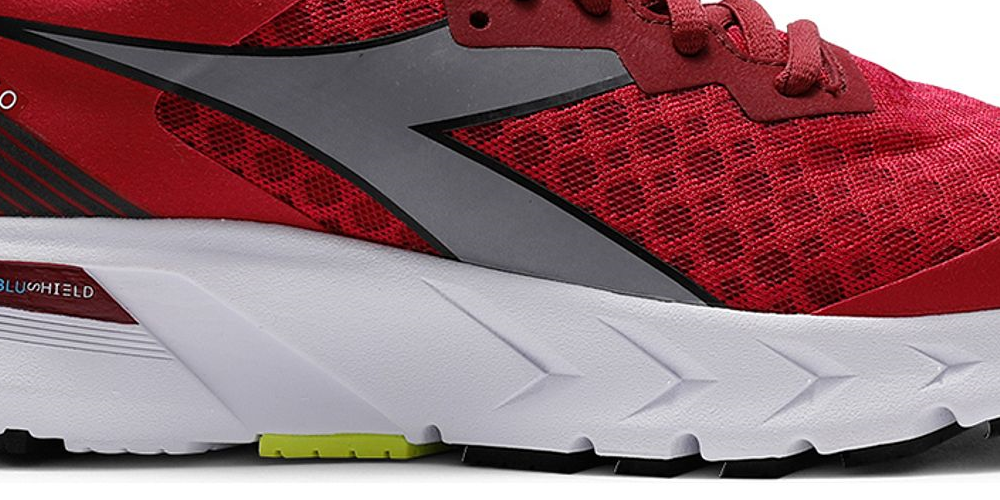 Tênis de corrida feminino Diadora Mythos Blushield Volo vermelho