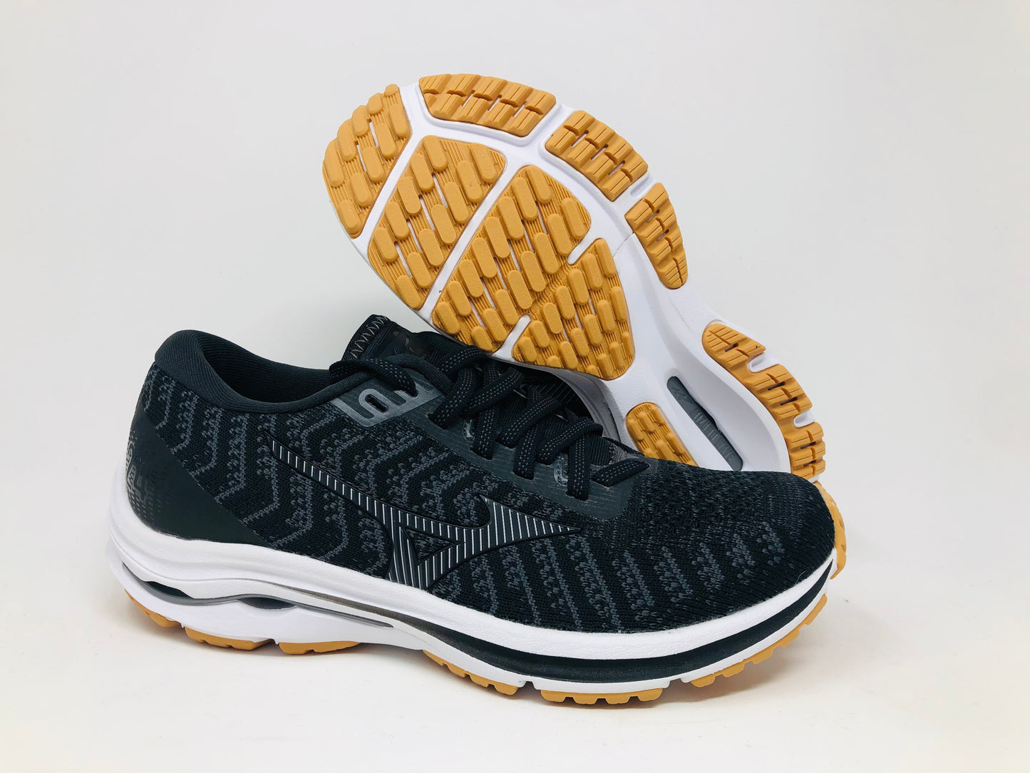 Tênis de corrida Mizuno Wave Rider 24 Waveknit feminino, preto/sombra escura, tamanho 6 B(M) EUA