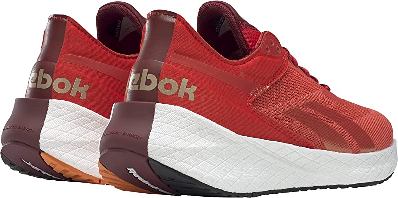 Tênis de corrida Reebok Floatride Energy feminino, laranja, tamanho 9,5 B(M) EUA