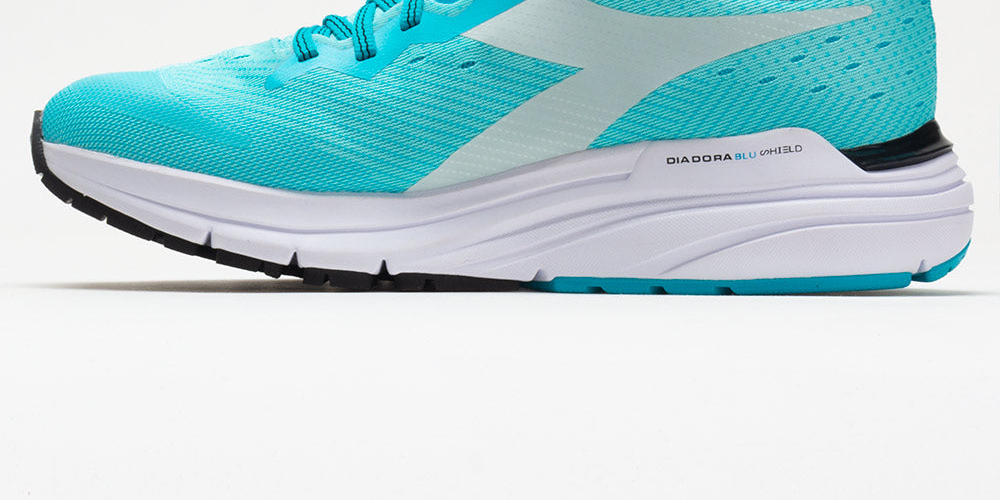 Tênis de corrida feminino Diadora Mythos Blushield 6 azul/scuba