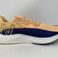 Tênis de corrida New Balance FuelCell Rebel v2 feminino Night Tide/Manga