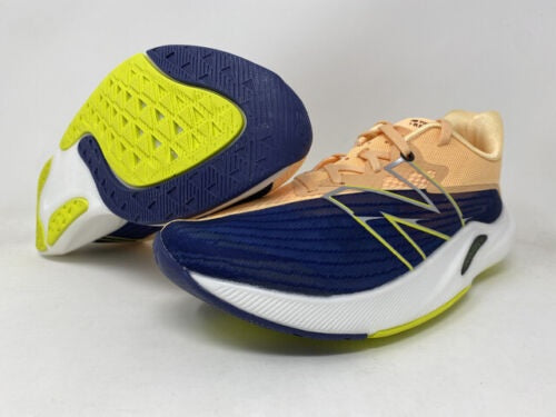 Tênis de corrida New Balance FuelCell Rebel v2 feminino Night Tide/Manga