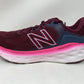 Tênis de corrida New Balance More v3 feminino, granada/rosa brilhante