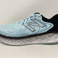 Tênis de corrida feminino New Balance 1080 V11 azul claro, tamanho 11,5 B (M) EUA