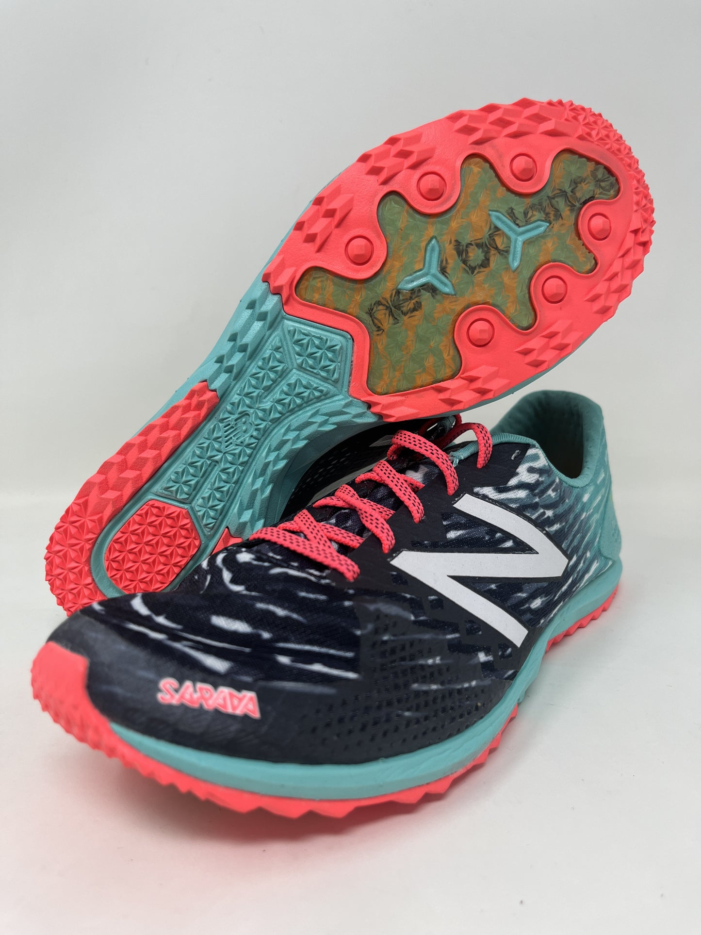 Tênis de corrida New Balance 900 V3 feminino, preto/azul