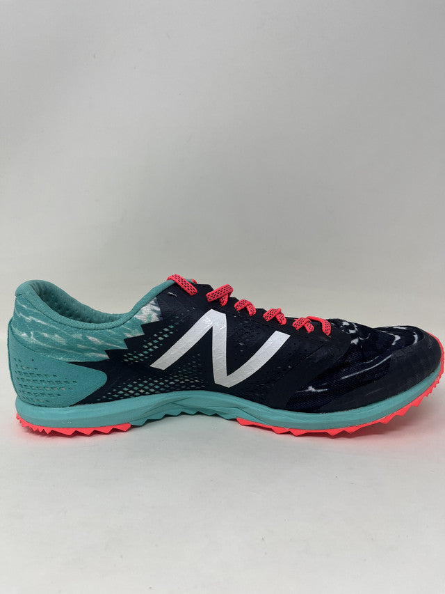 Tênis de corrida New Balance 900 V3 feminino, preto/azul