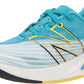Tênis New Balance Fuelcell Rebel V2 Feminino Branco/Céu Virtual