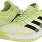 Tênis de tênis feminino Adidas Defiant Generation, verde limão/preto e amarelo