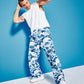 Calça utilitária conversível com estampa de ondas e ajuste relaxado para homens, tamanho G, azul, da Royalty by Maluma
