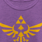 Camiseta gráfica Nintendo Girl's Legend of Zelda Triforce roxa, tamanho médio