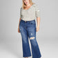 E agora esta calça jeans feminina rasgada e flare, azul, tamanho 22W