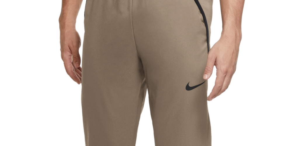 Calça de treino Nike Dri-FIT Woven masculina marrom tamanho M
