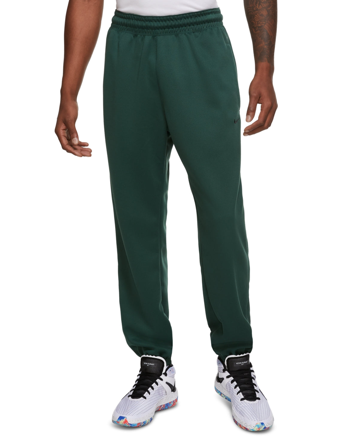 Calça de basquete Nike Spotlight masculina, verde, tamanho pequeno