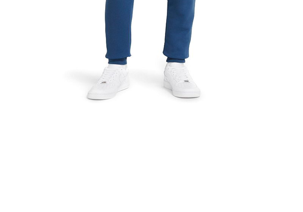 Calça de moletom Nike Sportswear Club Pocket Fleece Masculina em Azul Marina Escuro/Branco, Tamanho Médio