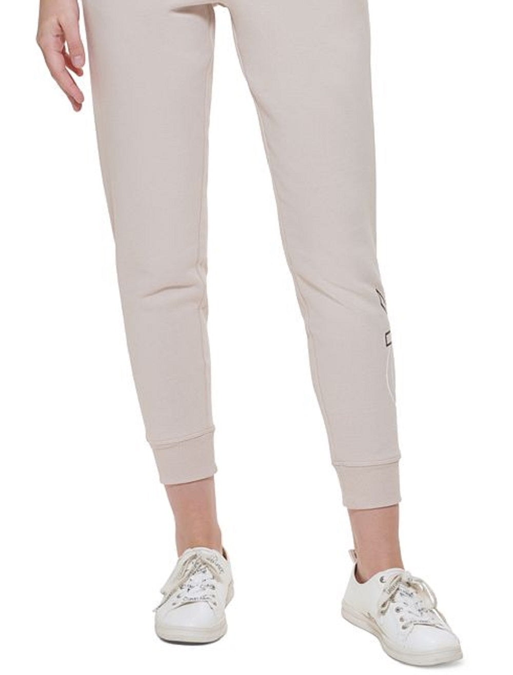 Calça jogger Calvin Klein feminina Outline Logo bege tamanho médio