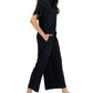 Macacão feminino Eileen Fisher com gola clássica, manga curta e perna larga, preto, tamanho extragrande