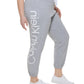 Calça jogger feminina Calvin Klein com logo cinza, tamanho 2X