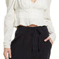 Blusa de algodão com gola alta Chloe Smocked da Free People para mulheres, branca, tamanho médio
