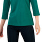 Polo Tommy Hilfiger feminino listrado com gola Johnny e manga 3/4, verde