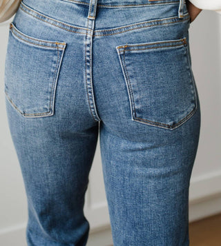 Judy Blue - Calça jeans slim fit com bainha destruída e cintura média