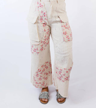 Pol - Calça jeans com detalhe de crochê e padrão ondulado