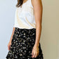 Molly Bracken - Asymmetrical Ruffle Hem Mini Skirt