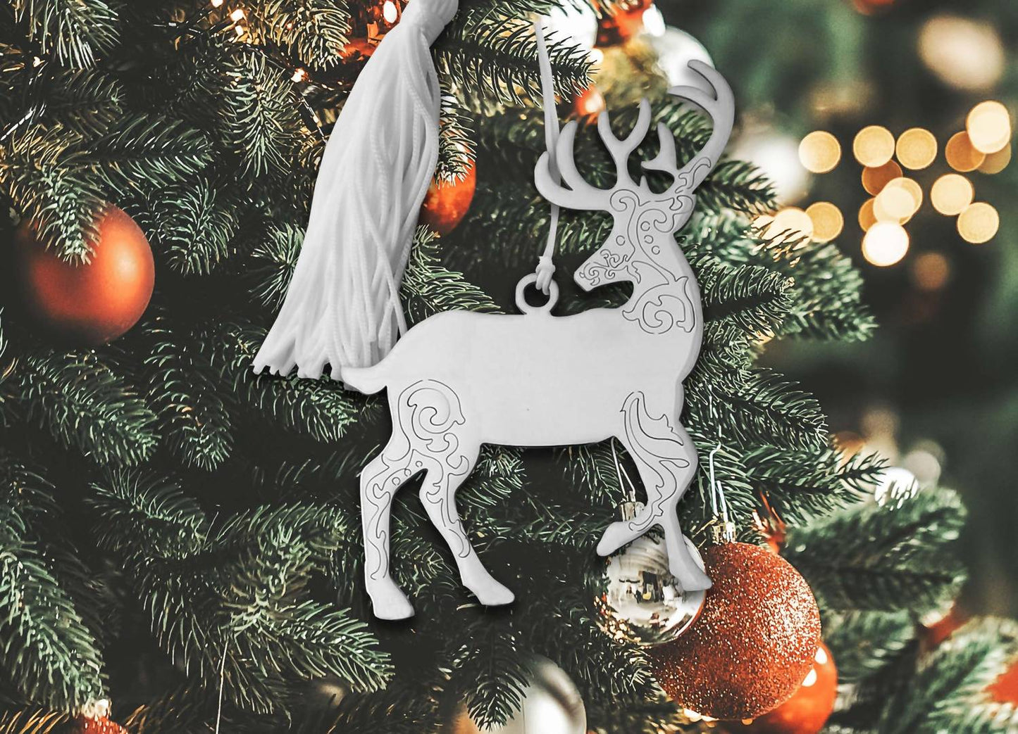 Creative Gifts International - Scroll Reindeer Ornament with White Tassel