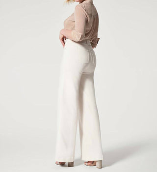 Spanx - Calça jeans larga com costura frontal