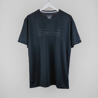 Calvin Klein - Camiseta leve, de secagem rápida e manga curta com proteção FPS 40+