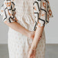 See And Be Seen - Aztec Print Pleated Square Neck Mini Dress