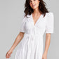 E agora este vestido longo de algodão com decote em V e bolinhas, tamanho X-G, branco