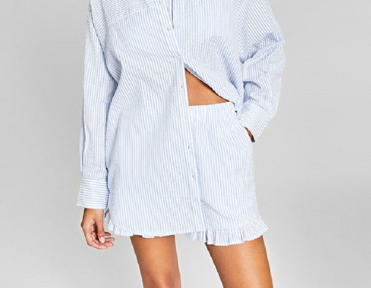 E agora esta camisa feminina grande de algodão azul tamanho médio