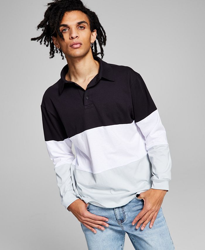 E agora esta camisa de rugby masculina com blocos de cores, preta, tamanho XX-G