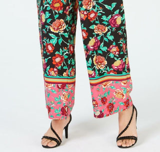 Calça feminina Thalia Sodi com estampa floral rosa e perna larga, tamanho grande