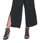 Calça feminina DKNY com bainha dividida e perna larga, preta