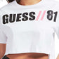 Camiseta curta feminina GUESS Clarissa Cotton com logo gráfico, branca, tamanho X-G