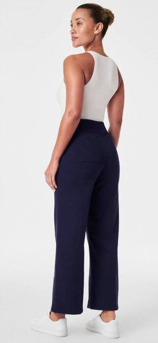 Spanx - Calça curta de sarja elástica com perna larga