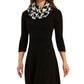 Vestido suéter estampado BCX Junior com ajuste evasê, preto, tamanho XS