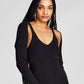 E agora este vestido justo feminino de malha canelada e ombros nus, preto, tamanho médio