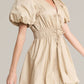 In The Beginning - bubble hem tie front mini dress