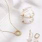Eklexic - Women's Oval Huggie Hoops With Pearl Drop Earrings