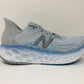 Tênis de corrida feminino New Balance 1080 V10 Cyclone/Team Carolina