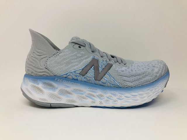 Tênis de corrida feminino New Balance 1080 V10 Cyclone/Team Carolina