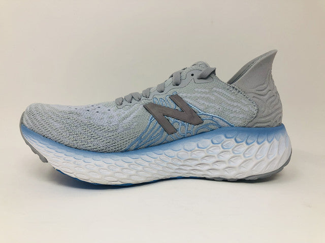 Tênis de corrida feminino New Balance 1080 V10 Cyclone/Team Carolina