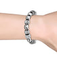Pulseira de berloques com cristais Swarovski em ouro branco 18k