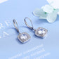 Brincos de gota com halo quadrado em ouro 18K